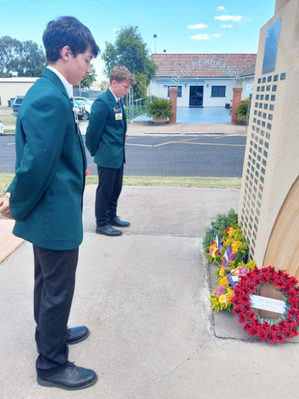 Texas State School captains Matthew Doherty and Brock Dawson lay wreaths at Texas Remembrance Day.