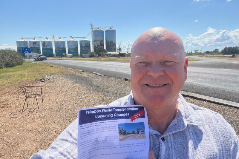 Cr Rob Mackenzie distributing FAQs in Yelarbon.