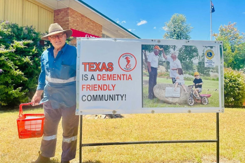When you’re next in High Street Texas be sure to check out the new Dementia Friendly Community sign in front of the Texas Post Office. The new sign was erected by John Wright (pictured), just in time for Dementia Australia’s visit to Texas on the 3rd November. Well done to all those involved. Photograph by Curly Ward