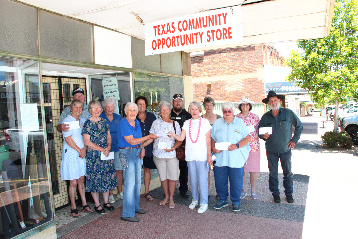 Accepting the kind donations from the Texas Community Opportunity Store last Friday morning were: (L-R): David & Irene Thompson (Texas Jockey Club), Mary Schwartz (Sacred Heart Catholic Church), Joan White (Texas Home Life Care inc.), Lurlene Keane (President of the Texas Community Opportunity Store handing out the cheques), Sonia Duke (Texas Home Life Care inc.), Sandra Pianta (Texas QCWA), Senior Constable Paul Jarrett (Texas Police Legacy Charity Golf Day), Merrilyn Williams (Texas Tennis Club inc.), Mary Belford (Texas Men’s Shed), Jenny Paganin (TADDS - Texas & District Drought Support Inc.), Robyn Griffin (Texas Historical Society Inc.) and Eddie Voss (Texas & Inglewood Heritage Railway Society Inc.). Not pictured were representatives from the Texas P-10 State School P & C and Texas Amateur Swimming Club.
