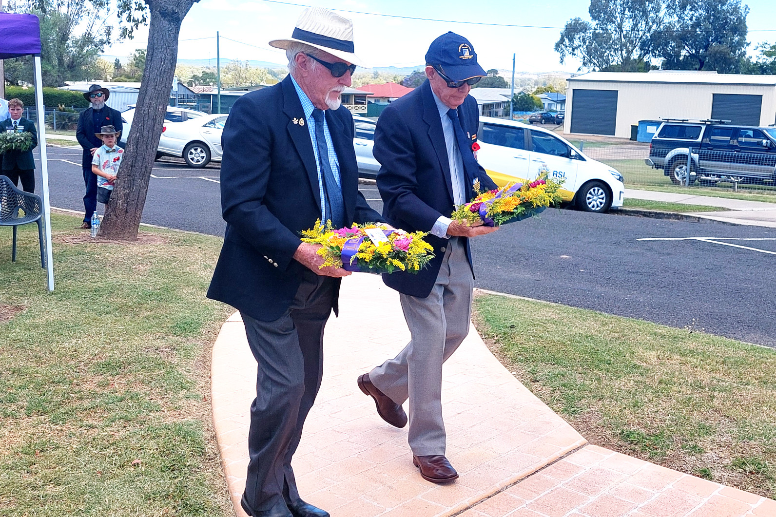 Mr Les Fletcher and Mr Vince Clegg laying wreaths on Remembrance Day. Photographs by Terry Acreman.